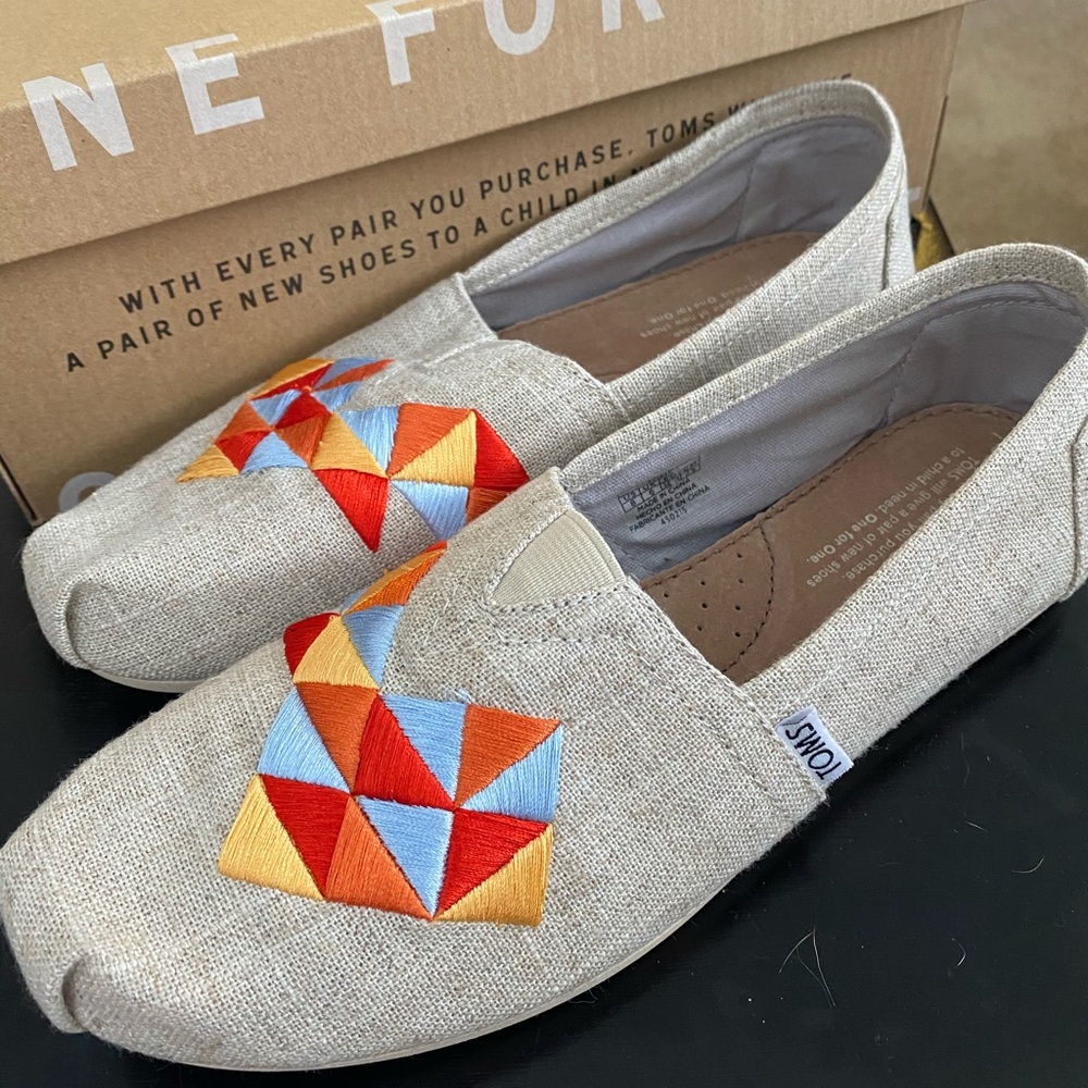 Toms natural burlap embroidered slip ons